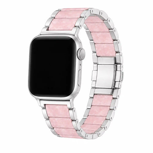 Pink marble acetate and stainless steel Apple Watch band on a white background