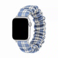 Blue gingham scrunchie Apple Watch band on a pure white background