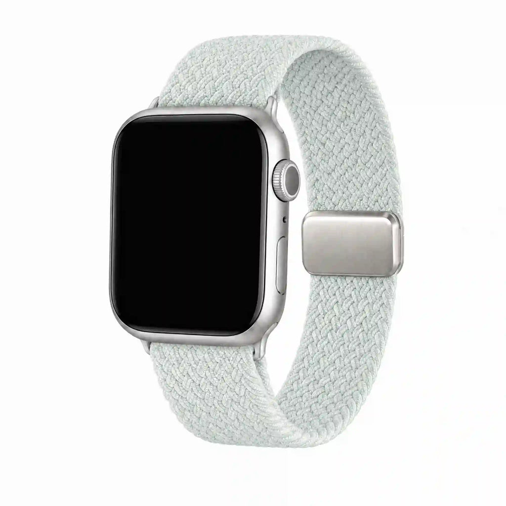 Céleste mint braided loop Apple Watch band with a silver adjustable clasp on a pure white background.