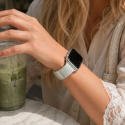 Close-up of the Céleste mint braided loop Apple Watch band with iced matcha