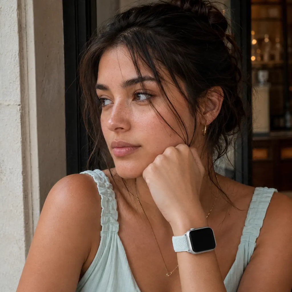 Café portrait featuring the Céleste mint braided loop Apple Watch band