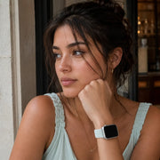 Café portrait featuring the Céleste mint braided loop Apple Watch band