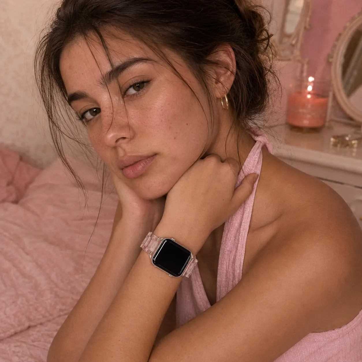 Juliette pink marble acetate Apple Watch band worn on wrist in a pink bedroom
