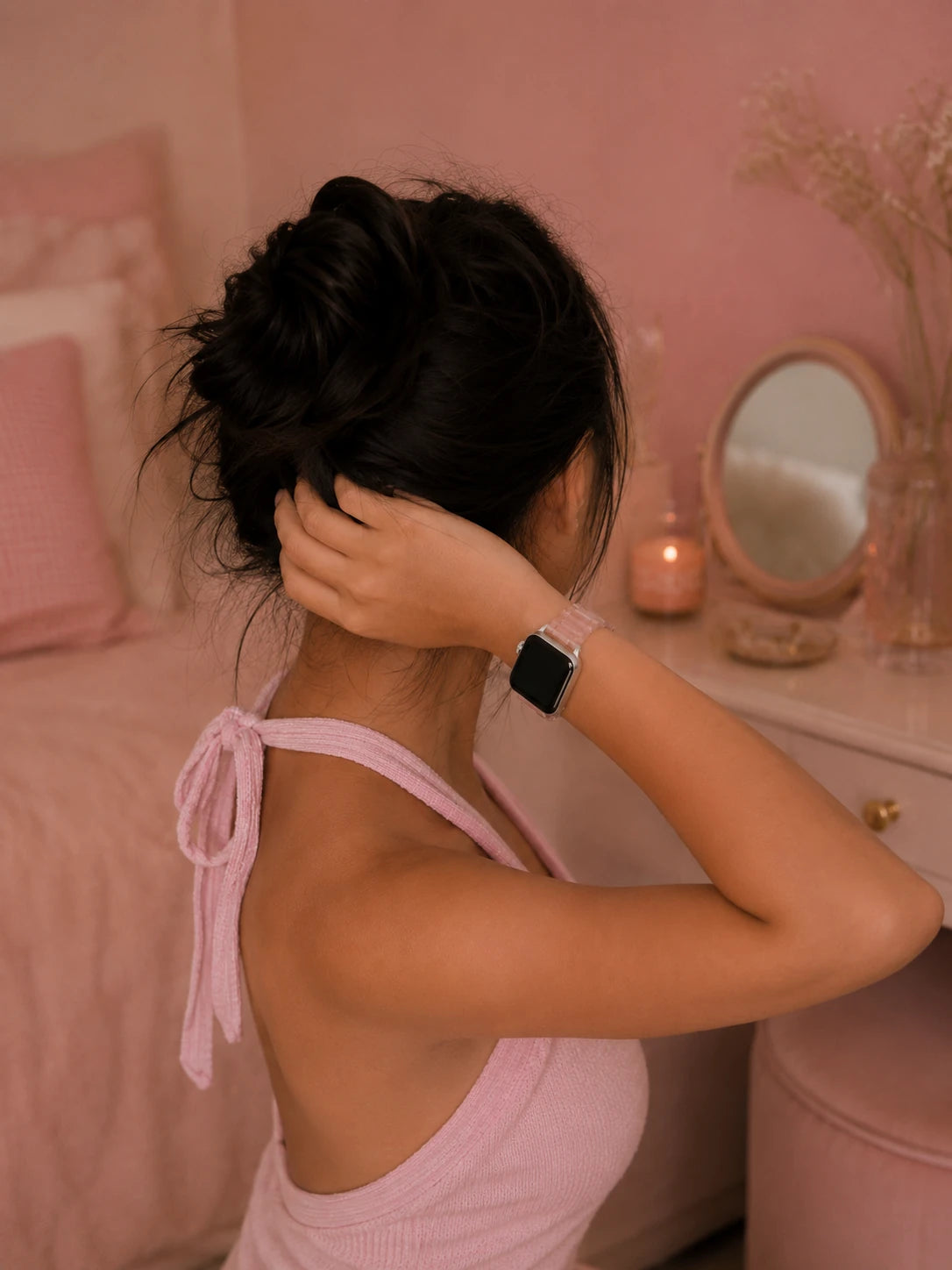 Back-view lifestyle shot of a woman wearing the Juliette Pink Marble Acetate Apple Watch Band.